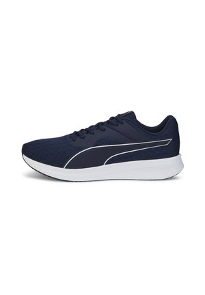 Scarpa da corsa navy con tomaia in rete, accenti bianchi, punta arrotondata e suola ammortizzata. Caratterizzata da una classica allacciatura e un design aerodinamico.