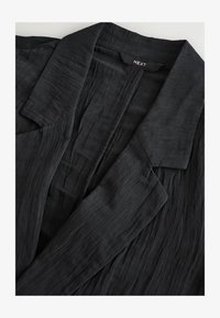Wybrany, black
