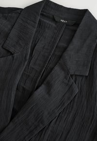 REGULAR FIT - Halflange jas - black