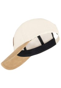 Baseball sapka, krém színű szövetből készült testtel, barna zamászéllel, fekete alsó résszel és kontrasztos varrással. Hátsó állítható pánt.