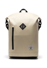 Beige waterproof backpack with a roll-top design, black accents, a front zipper pocket, and a logo patch at the bottom.