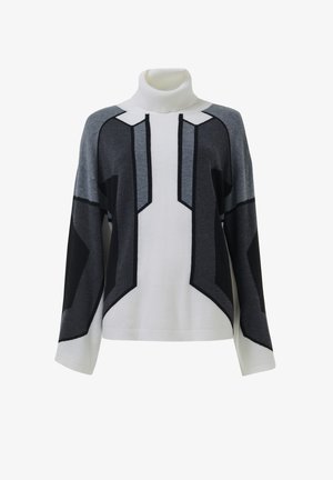 Pull à col roulé blanc avec des motifs géométriques en blocs de couleur noire, gris foncé et gris clair sur le devant et les manches.