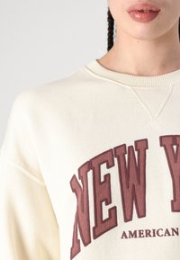 American Eagle Sportska majica - cream