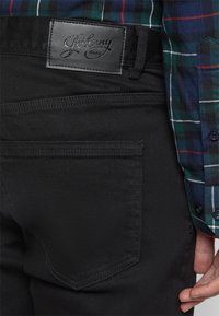 Johnny Bigg HUNTER SUPERFLEX - Calças de ganga justas - black