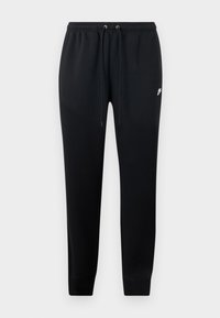 Schwarze Sweatpants mit einem Zugbandbund, schmal zulaufenden Beinen und einem kleinen weißen Logo auf dem linken Oberschenkel. Hergestellt aus einem weichen, strapazierfähigen Stoff.