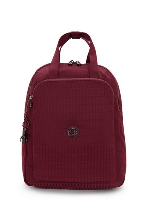 Burgundy backpack made of textured fabric, featuring a front zip pocket, short handles, and a circular logo on the front.