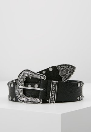 Black leather belt with ornate silver floral engraved buckle, tip, and loop, featuring silver stud accents along the strap.