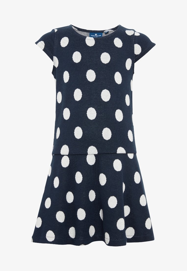 Robe bleu marine à manches courtes avec pois blancs et jupe évasée.