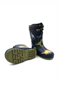 Rubber rain boots with a dark blue body featuring colorful dinosaur patterns, green soles, and a black top trim with adjustable laces.