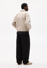 PULL&BEAR DARTED - Stoffhose - black