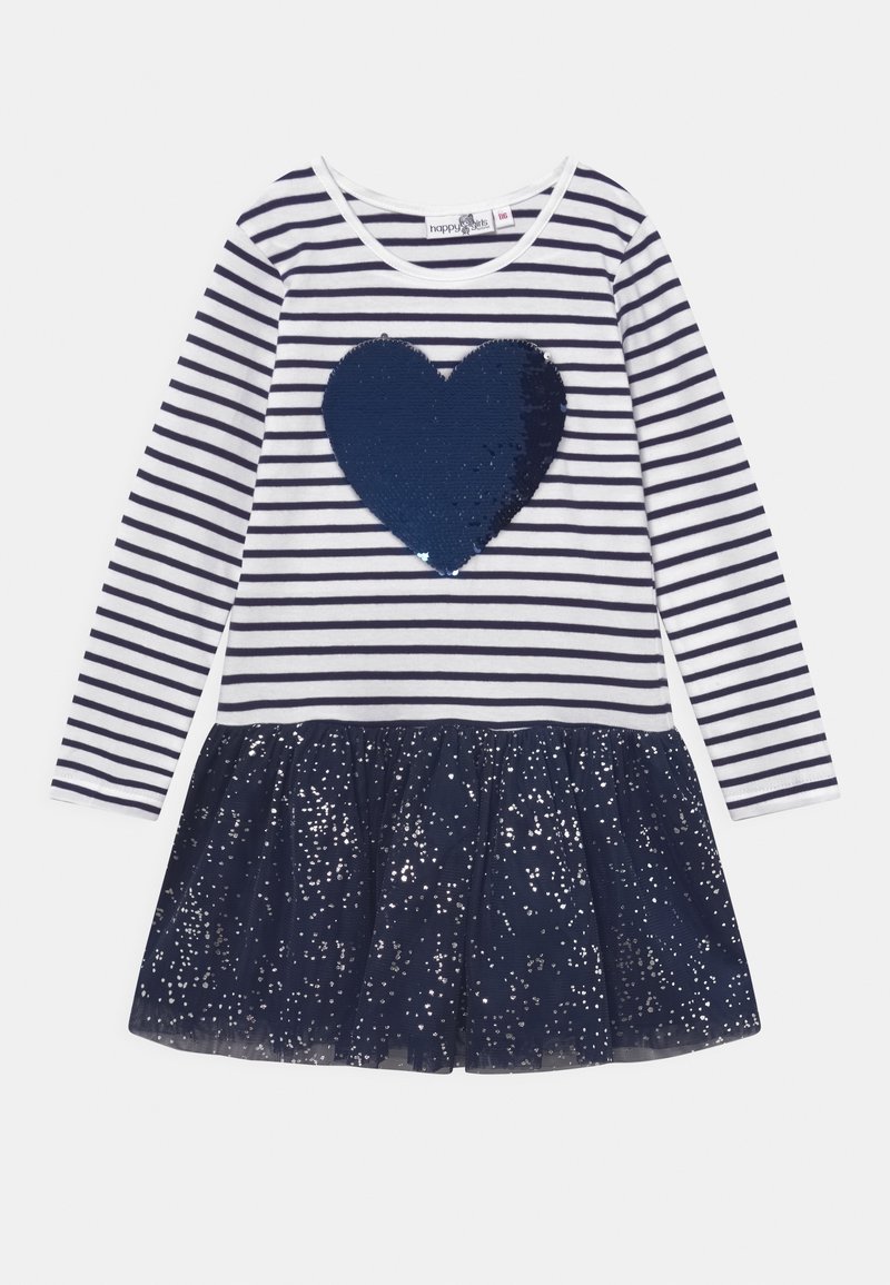 Pruhované šaty s dlouhým rukávem s tmavě modrým flitrovým srdcem na bílém podkladu, doplněné o plisovanou sukně z tmavě modrého tylu se stříbrnými třpytivými detaily.