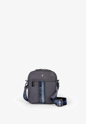 Gray crossbody bag with a zippered closure, featuring horizontal blue stripes and a metal logo accent. Adjustable strap included.