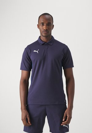 Polohemd in marineblau, mit Kragen und kurzen Ärmeln. Weißes Puma-Logo auf der linken Brust, aus atmungsaktivem Stoff mit zarter Textur.