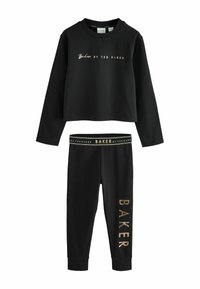 Czarny skrócony sweter oraz dopasowane legginsy, wykonane z miękkiego materiału. Posiadają złotą foliową nazwę "BAKER" na obu elementach. Prosty design.