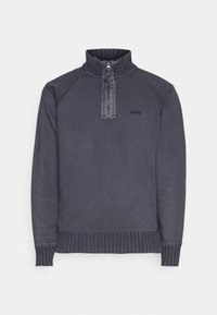 Sweat-shirt à col montant zippé, gris foncé, avec poignets et ourlet côtelés. Présente un logo sur la poitrine et un design de manches raglan.