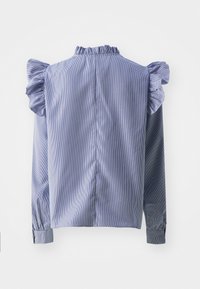 Μπλούζα με μπλε και άσπρες ρίγες, με ραμμένο λαιμό και φουσκωτά μανίκια, που διαθέτει μακριά μανίκια και ίσια σχεδίαση στην πλάτη.