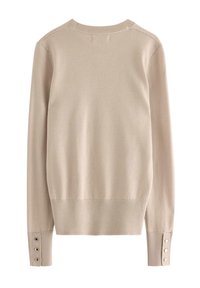 Beige tröja med rund halsringning, ribbade muddar med knappdetaljer och en slät textur. Enkel, figurnära design i enfärgat.