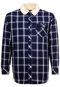 Námořnická károvaná košile s umělým beránkem na límci, s knoflíkovým zapínáním, dlouhými rukávy a náprsní kapsou s černým detailním knoflíkem.