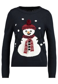 Maglione blu navy con un pupazzo di neve sorridente che indossa un cappello rosso con pon-pon e una sciarpa rossa a motivo, circondato da fiocchi di neve che cadono.