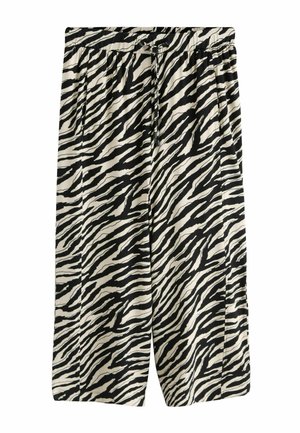 Pantaloni largi cu imprimeu zebrat alb-negru, cu talie elastică și șnur de ajustare.