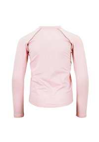 Chemise à manches longues de couleur rose pâle, fabriquée à partir d'un tissu lisse et extensible. Présente des coutures plates et un col rond.