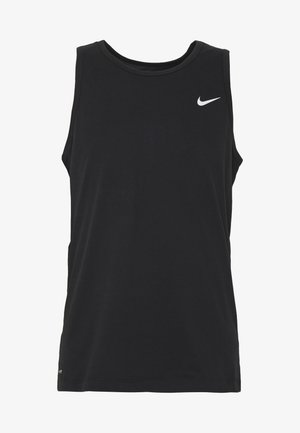 Svart ermeløs treningstopp laget av myk bomullsblanding. Har rund halslinning og en liten hvit Nike-logo på brystet.