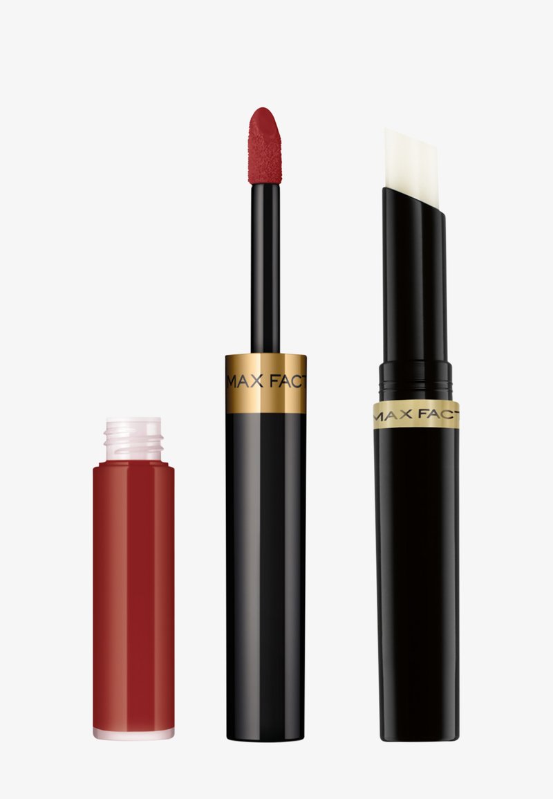 Three Max Factor lip products: a red liquid lipstick with a doe-foot applicator, a transparent balm in a black tube, and a glossy red container.