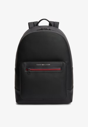 Black backpack made of textured material, featuring a smooth bottom panel, front zip pocket with red accent, and logo detail.