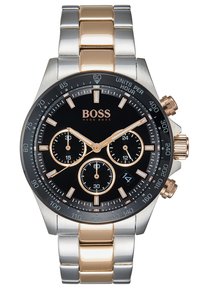 Montre chronographe avec cadran noir, bracelet en acier inoxydable argent et or, trois sous-cadrans et accents en or rose sur les marqueurs d'heure et les aiguilles.