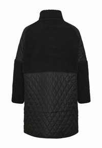 Black coat featuring a quilted lower section and a textured upper portion. It has a high collar and wide sleeves. Smooth and fuzzy materials used.