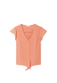 Blouse couleur pêche avec col en V, manches courtes évasées, fermeture à boutons sur le devant et nœud noué à l'ourlet. Présente un motif texturé subtil.