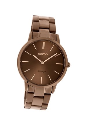 Brown metal watch with a round case, linked bracelet, minimalistic dial, and rose gold accents. Features hour markers and hands.