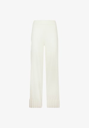 Pantaloni bianchi a gamba larga realizzati in tessuto morbido con una texture liscia. Presentano polsini a coste sul fondo. Design semplice e lineare.