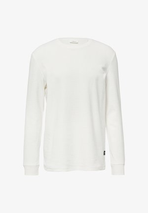 Weißes Langarmshirt aus strukturiertem Stoff, mit Rundhalsausschnitt und gerippten Bündchen. Auf der Brust befindet sich ein kleines Logo.