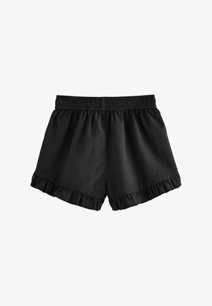 Fekete pamut sort elasztikus derékszárral, fodros szegéllyel és laza szabással, amely kényelmet és szabad mozgást biztosít.