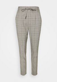 Rutiga byxor i grå nyanser med snörning i midjan, avsmalnande ben och textil med struktur. Har ett rutmönster genom hela plagget.