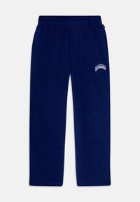 Σκούρο μπλε φόρμες με ελαστική ζώνη, δύο πλαϊνές τσέπες και λευκή γραφική λεπτομέρεια κοντά στη ζώνη. Μαλακή υφή, ίσια πόδια.