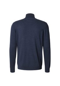 Tumma sininen neulepaita, jossa on pitkät hihat ja korkea kaulus. Pehmeä rakenne, yksivärinen, vähäisellä yksityiskohdalla ja istuva alahelma.