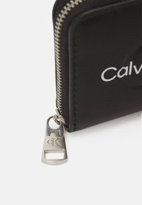 Calvin Klein Jeans Portafoglio - black