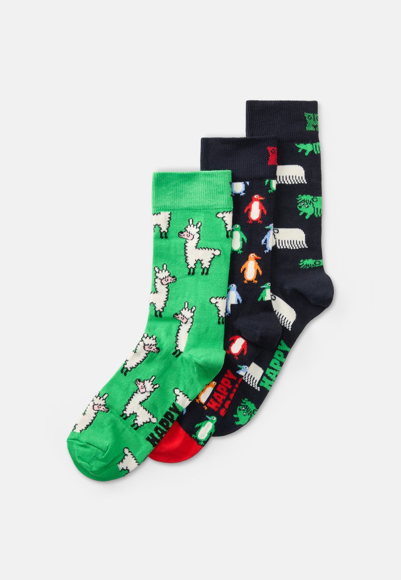 Three pairs of cotton socks featuring colorful animal designs: green with llamas, navy with penguins, and black with various animals.