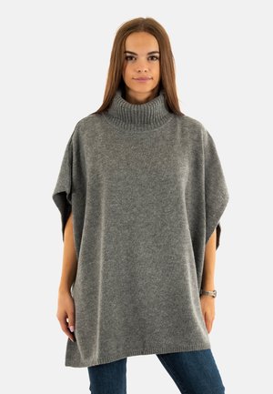 Poncho en tricot gris avec un col à côtes haut, des manches amples et un tissu texturé. Présente une coupe décontractée et une finition lisse.