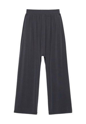 Voľné tmavosivé široké nohavice so stiahnutým elastickým pásom a jemnou, splývavou látkou.