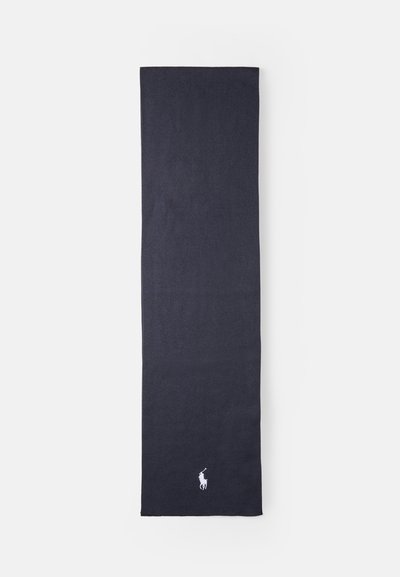 Cachecol de lã azul-marinho com uma textura suave e um formato retangular elegante. Apresenta um pequeno logótipo branco numa das extremidades.