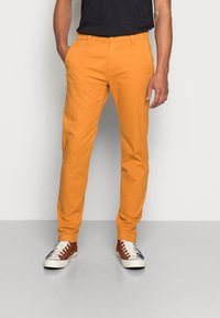 Levi's® XX CHINO SLIM TAPER PANTS - Chinos - golden oak
