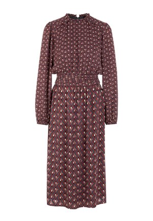 Long-sleeve dress in dark burgundy with a geometric diamond pattern in red and beige. Features a smocked waist and high neck.