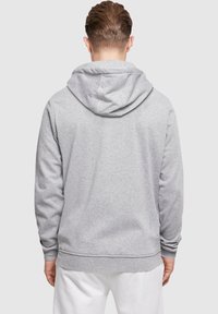 Merchcode LOVE YOURSELF FIRST - Mikina s kapucí - heather grey