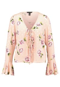 Blusa floreale rosa con maniche a Campana lunghe, caratterizzata da una scollatura a V e dettaglio con nodo frontale. Il tessuto ha un aspetto morbido e testurizzato con pois.