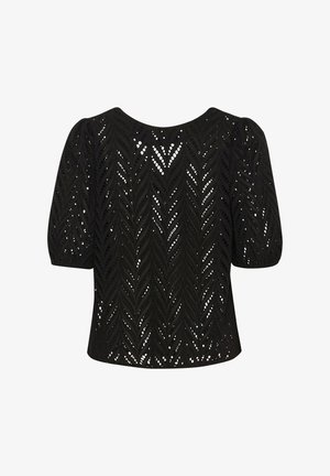 Melnās krekls ar rakstainu, atvērtu adījumu, īsām, pūkām piedurknēm un apaļu kakla izgriezumu. Malas ir taisnas un atrodas jostas vietā.