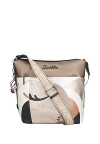 Beżowo-kremowa torebka na ramię z abstrakcyjnym wzorem twarzy, regulowanym paskiem, metalowym zamkiem błyskawicznym oraz logo "Anekke" na teksturowanej górnej części.