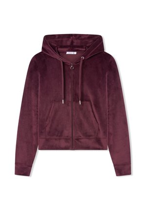 Burgundowa bluza z zamkiem błyskawicznym, wykonana z miękkiego, aksamitnego materiału. Posiada przednią kieszeń, kaptur ze sznurkiem oraz ściągacze na rękawach. Prosty, krótki fason.